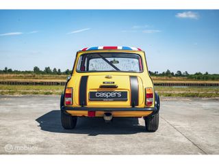 Austin Mini 1000 Super de Luxe | Britax tribute