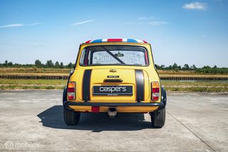 Austin Mini 1000 Super de Luxe | Britax tribute