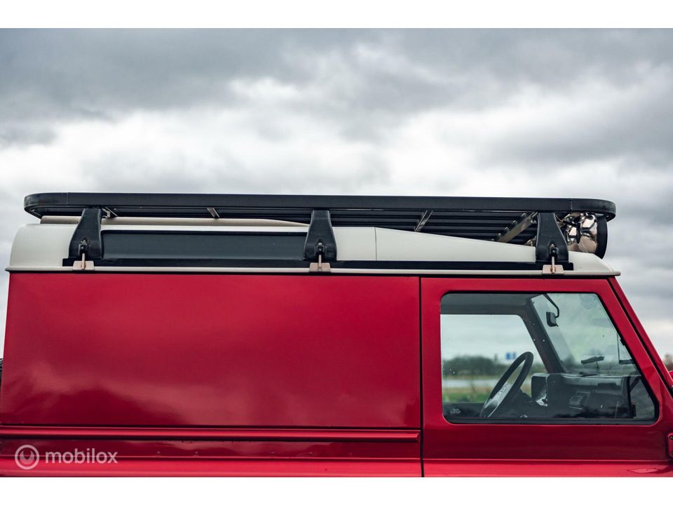 Land Rover Defender 2.5 Tdi 90" Hard Top | Rood | Dakrek