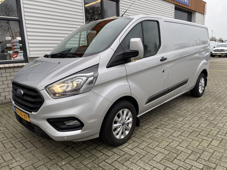 Ford Transit Custom 320 2.0 TDCI 130pk automaat L2H1 Trend / rijklaar € 18.950 ex btw / lease vanaf € 401 / airco / cruise / navi / zilver metallic / stoelverwarming !