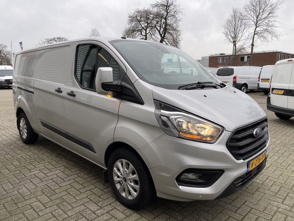 Ford Transit Custom 320 2.0 TDCI 130pk automaat L2H1 Trend / rijklaar € 18.950 ex btw / lease vanaf € 401 / airco / cruise / navi / zilver metallic / stoelverwarming !