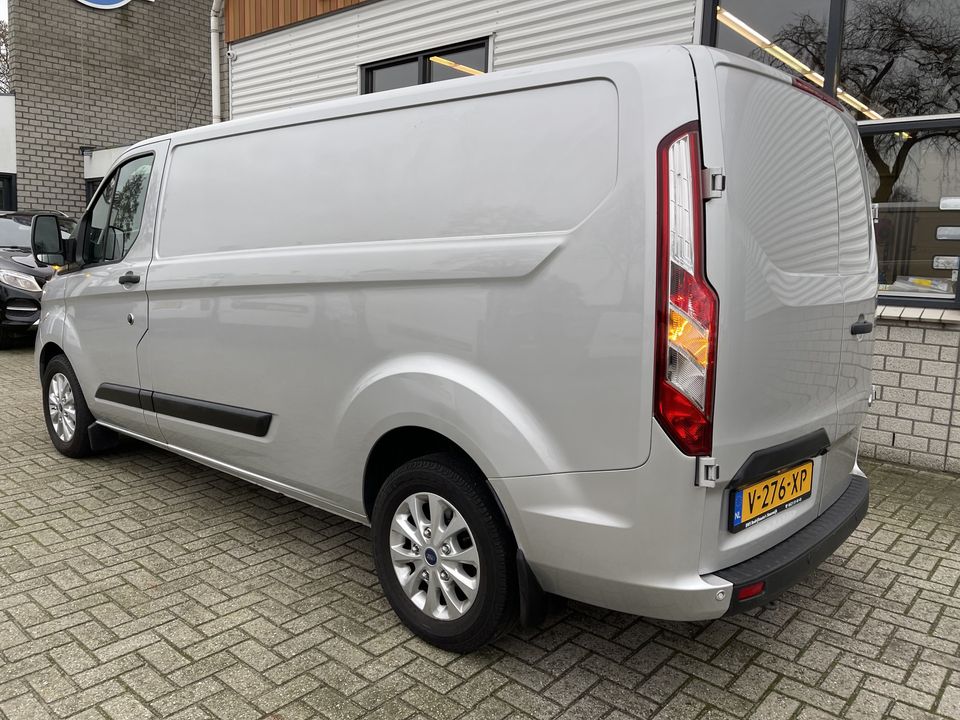 Ford Transit Custom 320 2.0 TDCI 130pk automaat L2H1 Trend / rijklaar € 18.950 ex btw / lease vanaf € 401 / airco / cruise / navi / zilver metallic / stoelverwarming !