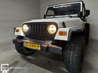 Jeep Wrangler 4.0i - 6 Cilinder 4x4 Nieuwe Soft top! GAAF!