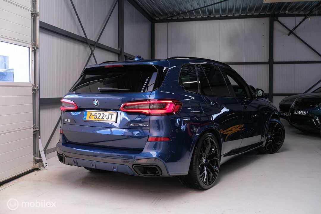 BMW X5 xDrive45e High Executive | M Sport | Phytonic Blue | Panorama | Massage | 22 inch | Trekhaak |