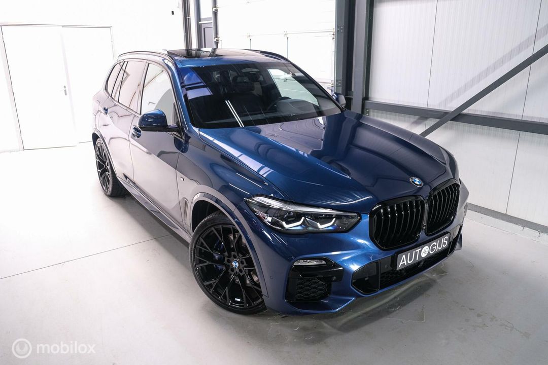 BMW X5 xDrive45e High Executive | M Sport | Phytonic Blue | Panorama | Massage | 22 inch | Trekhaak |