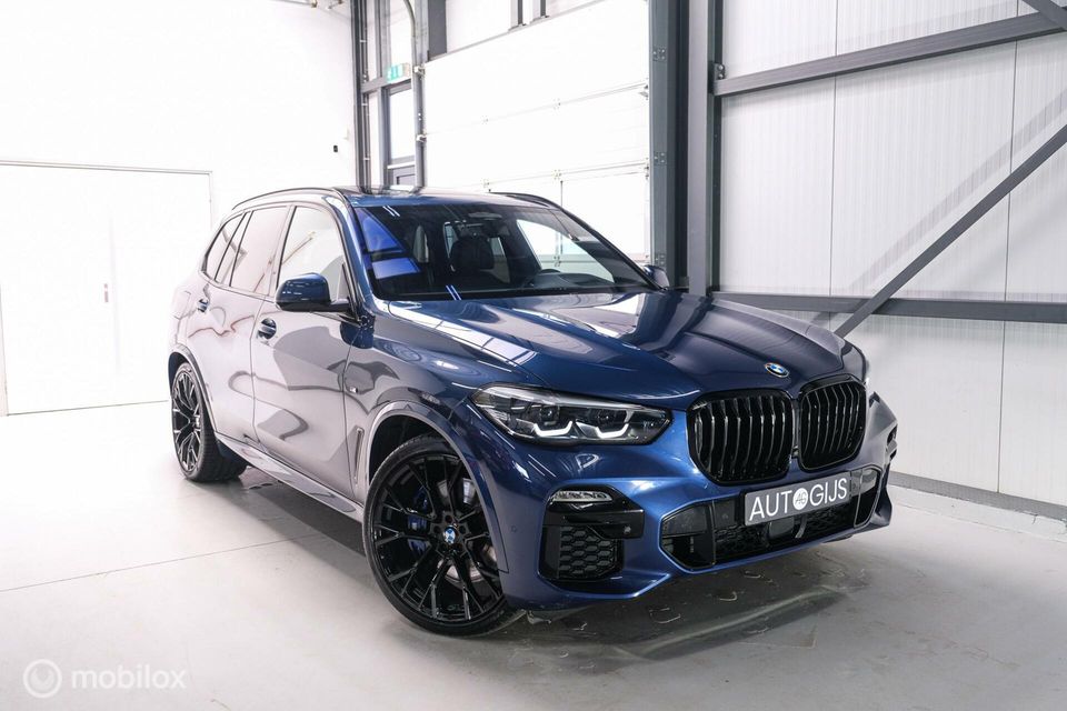 BMW X5 xDrive45e High Executive | M Sport | Phytonic Blue | Panorama | Massage | 22 inch | Trekhaak |