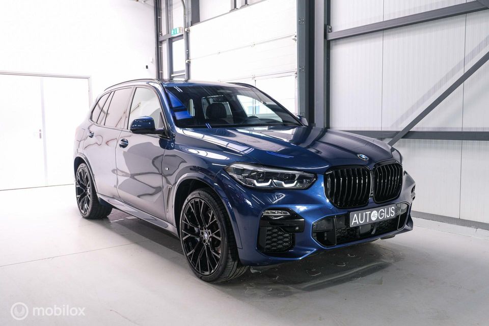 BMW X5 xDrive45e High Executive | M Sport | Phytonic Blue | Panorama | Massage | 22 inch | Trekhaak |