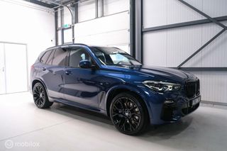 BMW X5 xDrive45e High Executive | M Sport | Phytonic Blue | Panorama | Massage | 22 inch | Trekhaak |