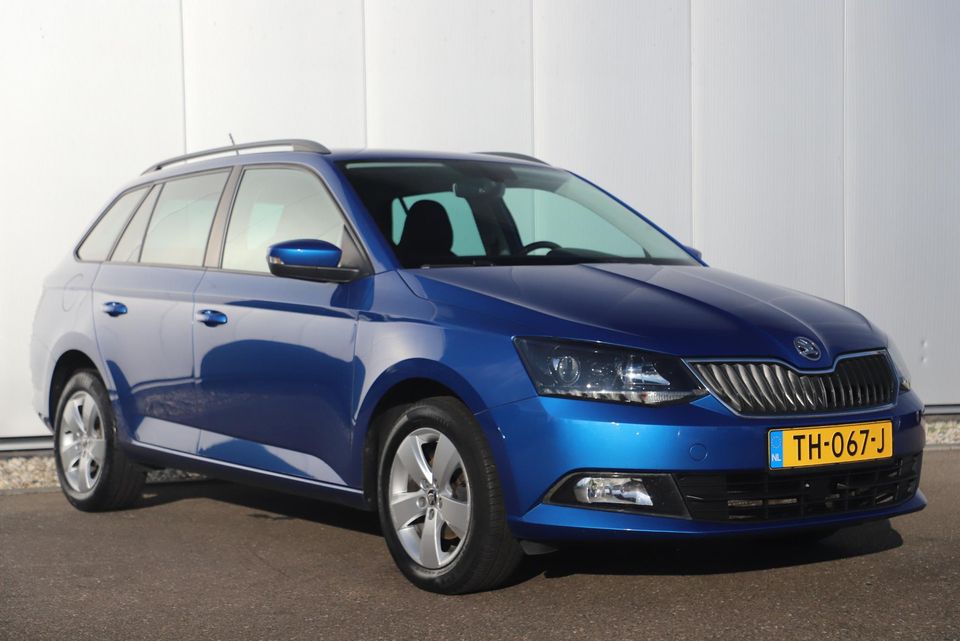 Škoda Fabia Combi 1.0 TSI Style 95PK RS Stoelen Navigatie Clima Cruise 16 inch LMV Parkeersensor Getint Glas Zwarte Hemel