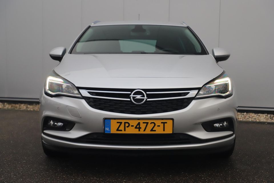 Opel Astra Sports Tourer 1.0 Turbo 120 Jaar Edition 105PK Trekhaak 16 inch LMV Navigatie Carplay Android Clima Cruise Parkeersensors