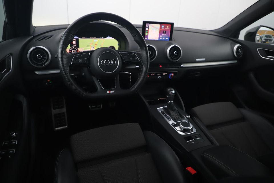 Audi A3 Sportback 30 TFSI Sport S Line Edition Automaat Black Optic Quantumgrey 19 inch Virtual Cockpit Half Leder Navigatie Carplay Android Bluetooth Stoelverwarming Parkeersensors Spoilers