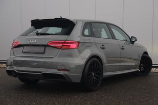 Audi A3 Sportback 30 TFSI Sport S Line Edition Automaat Black Optic Quantumgrey 19 inch Virtual Cockpit Half Leder Navigatie Carplay Android Bluetooth Stoelverwarming Parkeersensors Spoilers