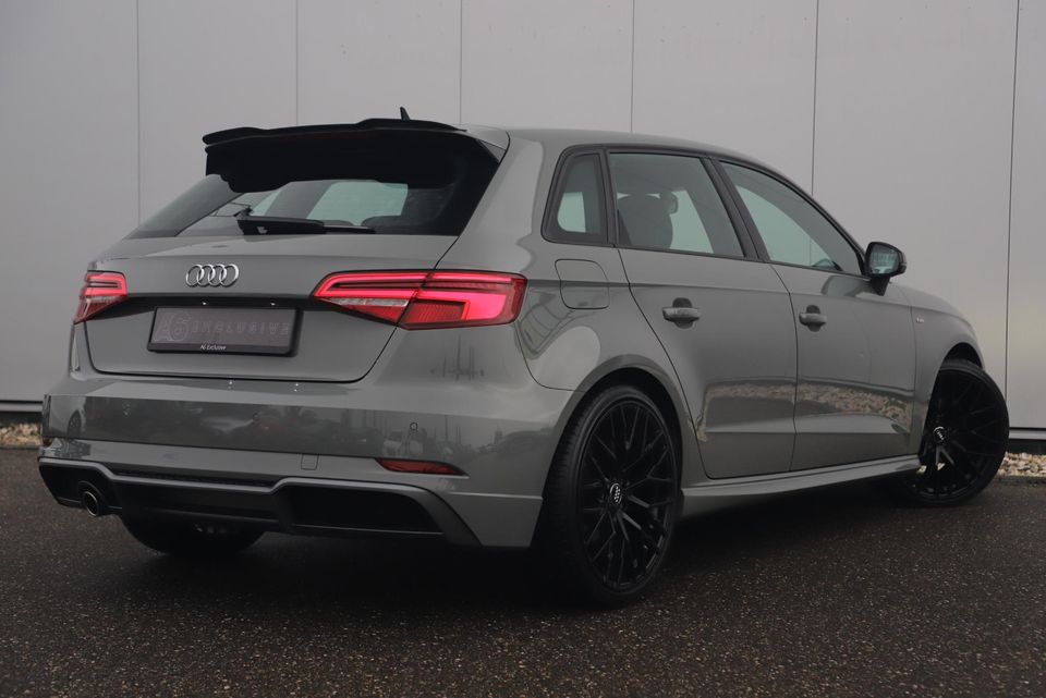 Audi A3 Sportback 30 TFSI Sport S Line Edition Automaat Black Optic Quantumgrey 19 inch Virtual Cockpit Half Leder Navigatie Carplay Android Bluetooth Stoelverwarming Parkeersensors Spoilers