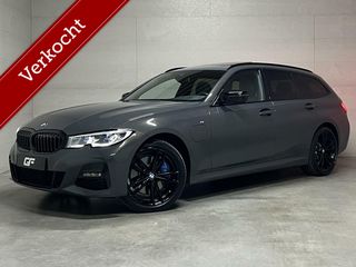 BMW 3 Serie Touring 330e xDrive M Sport Davitgrau Laser Pano