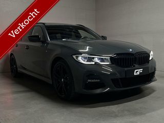 BMW 3 Serie Touring 330e xDrive M Sport Davitgrau Laser Pano