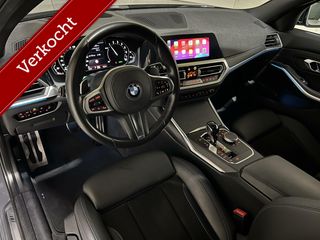 BMW 3 Serie Touring 330e xDrive M Sport Davitgrau Laser Pano