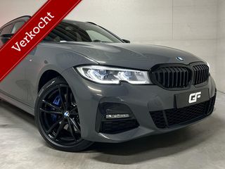 BMW 3 Serie Touring 330e xDrive M Sport Davitgrau Laser Pano