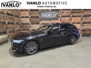 BMW 3 Serie Touring 330e xDrive Business Edition Plus M Onderstel Laser LED HUD LM