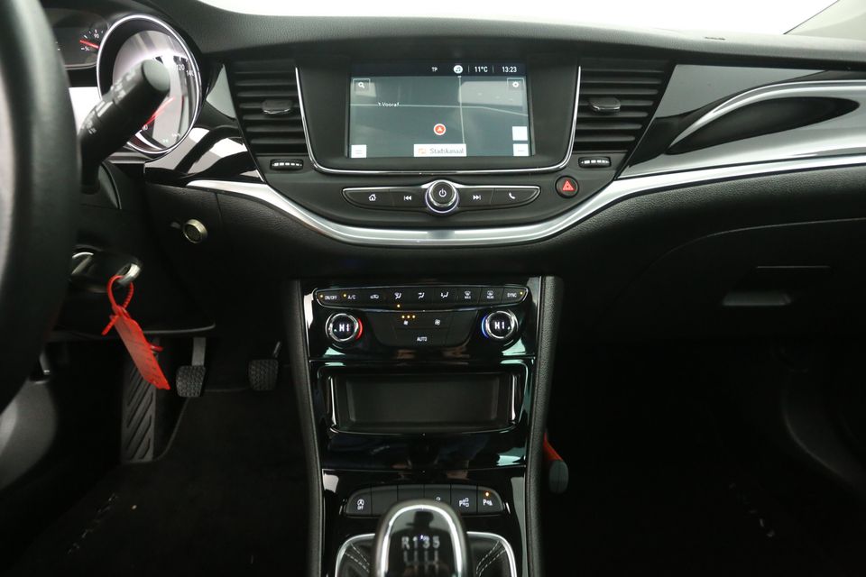 Opel Astra 1.2 Sports Tourer Clima Camera Cruise Carplay PDC Navigatie LED DAB+ Trekhaak 16"LMV