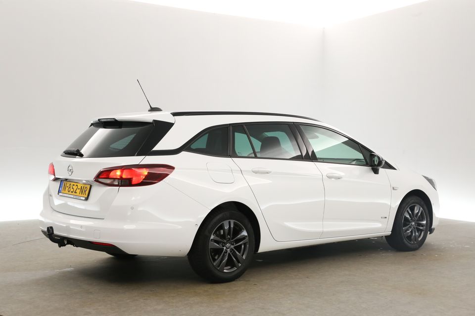 Opel Astra 1.2 Sports Tourer Clima Camera Cruise Carplay PDC Navigatie LED DAB+ Trekhaak 16"LMV