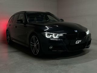 BMW 3 Serie Touring 318i M-Sport Pano H/K Leer Cruise NAP