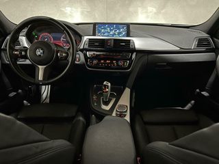 BMW 3 Serie Touring 318i M-Sport Pano H/K Leer Cruise NAP