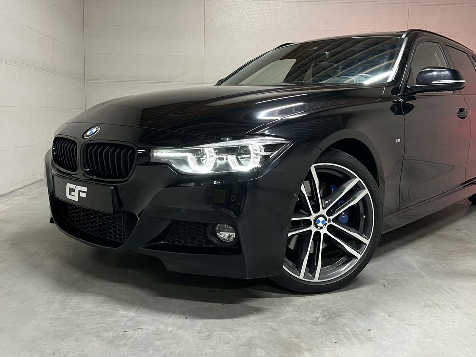 BMW 3 Serie Touring 318i M-Sport Pano H/K Leer Cruise NAP