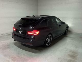 BMW 3 Serie Touring 318i M-Sport Pano H/K Leer Cruise NAP