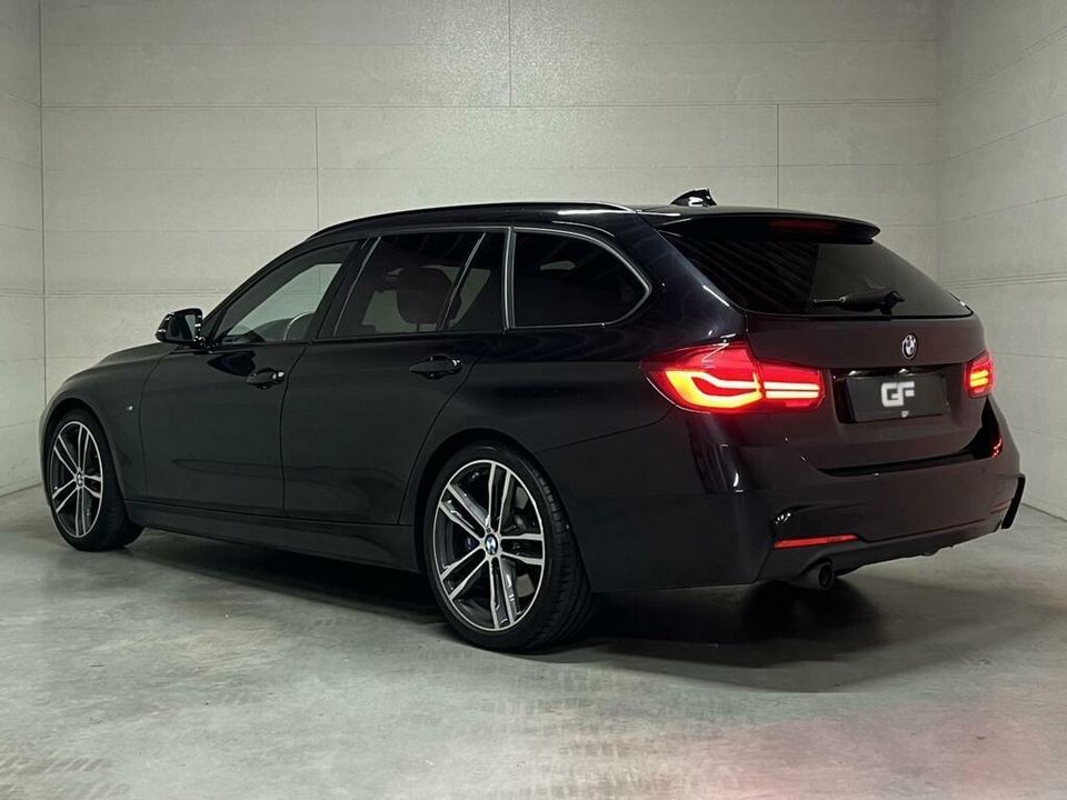 BMW 3 Serie Touring 318i M-Sport Pano H/K Leer Cruise NAP