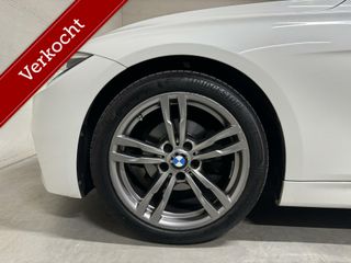 BMW 3 Serie Touring 318i M Sport Leer Navi Cruise NAP