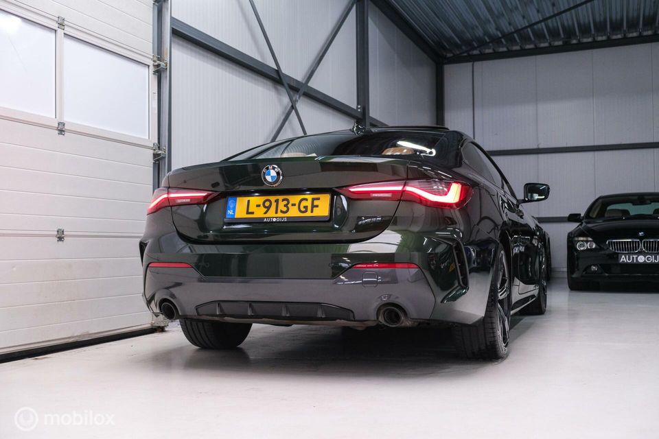 BMW 4 Serie Coupé 420i High Executive | San Remo Grun | Camera | Laser LED | Schuifdak |