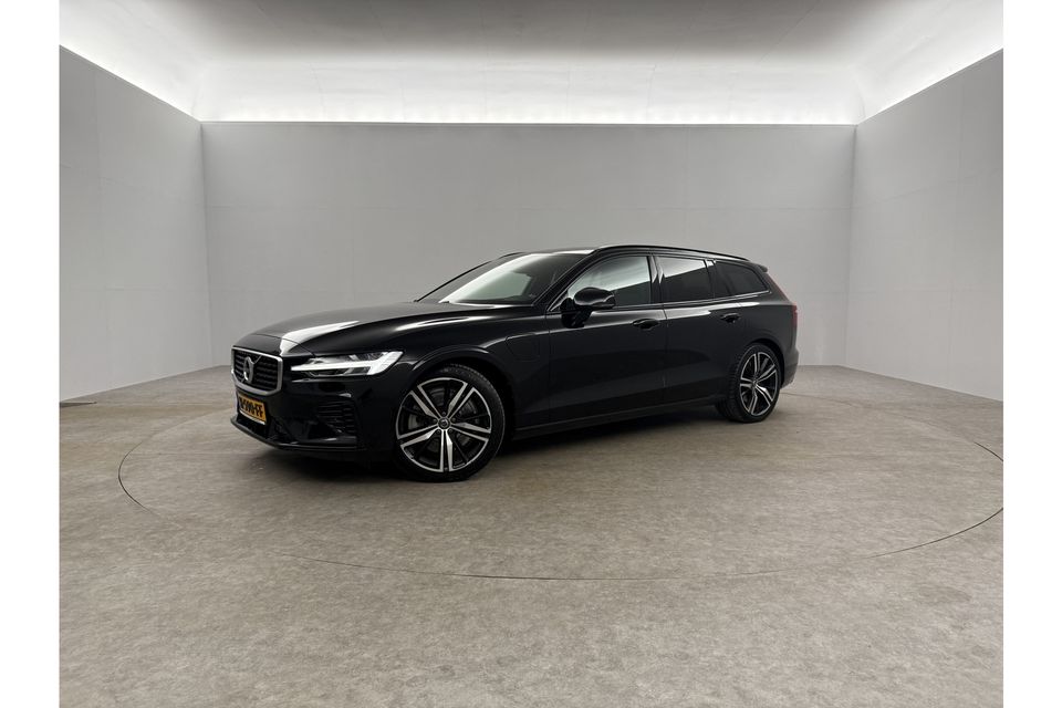 Volvo V60 2.0 T6 Twin Engine AWD R-Design | Harman/Kardon | 342PK Camera LED Carplay Clima Sfeerverl. Memory-Seat Trekhaak Navi Leder Virtual PDC Stoelverwarming 19"LMV