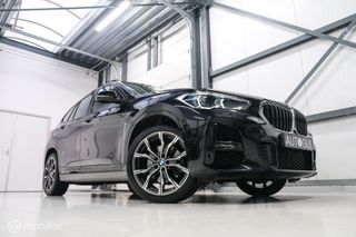 BMW X1 xDrive25e eDrive M Edition 220 pk | Camera | NL auto NAP | DAB | Ambiance | 19 inch | Leder | Sportline |