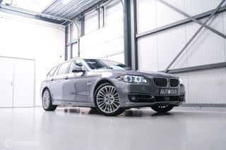 BMW 5 Serie Touring 528i LCI High Luxury Ed | soft close | head up | Panoramadak | camera | trekhaak | lci | led |