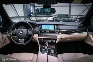 BMW 5 Serie Touring 528i LCI High Luxury Ed | soft close | head up | Panoramadak | camera | trekhaak | lci | led |